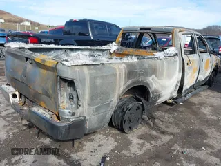 2017 Ram 2500 Tradesman with VIN 3C6UR5HJ8HG538817, listed as a IAAI auction lot 41492975 with 128,000 mi miles and . Bid and sale history available at DreamBid. Image 4.