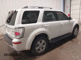 2011 Mercury Mariner Premier with VIN 4M2CN9HG3BKJ02026, listed as a IAAI auction lot 40254703 with 99,000 mi miles and . Bid and sale history available at DreamBid. Image 4.