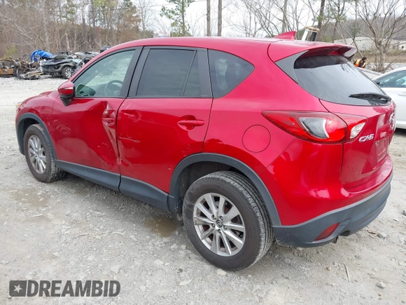 2016 Mazda CX-5 Touring z VIN JM3KE2CY3G0894441, wystawiony jako IAAI lot #41508767 z przebiegiem 88 554 mil mil oraz . Historia ofert i sprzedaży dostępna na DreamBid. Obrazek 3.