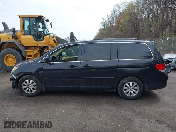 2009 Honda Odyssey EX-L with VIN 5FNRL387X9B051750, listed as a IAAI auction lot 41953221 with 205,142 mi miles. Bid and sale history available at carsss.com. Image 15.