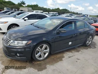 2014 Volkswagen CC R-Line with VIN WVWAN7AN5EE534548, listed as a Copart auction lot 61730364 with 104,545 mi miles and Salvage Title. Bid and sale history available at carsss.com. Image 1.