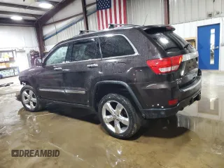 2013 Jeep Grand Cherokee Overland with VIN 1C4RJFCT7DC587329, listed as a Copart auction lot 53432625 with 98,938 mi miles and Salvage Title. Bid and sale history available at carsss.com. Image 2.
