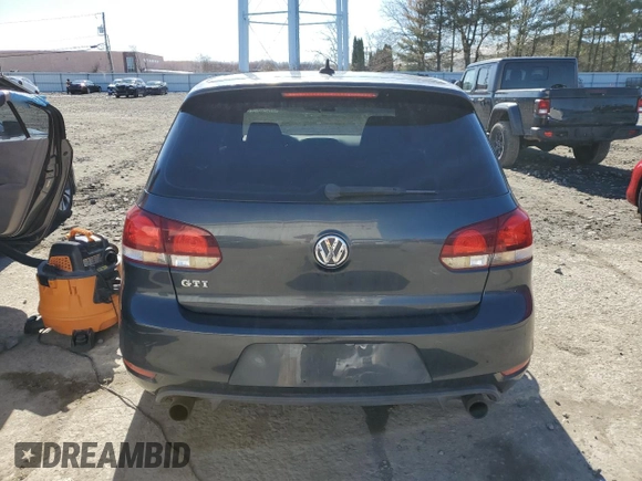 2010 Volkswagen GTI z VIN WVWFD7AJ2AW373022, wystawiony jako Copart lot #49448755 z przebiegiem 66 983 mil mil oraz Szkoda całkowita • Salvage title. Historia ofert i sprzedaży dostępna na DreamBid. Obrazek 6.