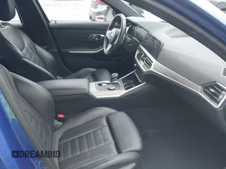 2019 BMW 3 Series 330i xDrive with VIN WBA5R7C55KAE82585, listed as a IAAI auction lot 42178005 with 50,719 mi miles and . Bid and sale history available at DreamBid. Image 5.