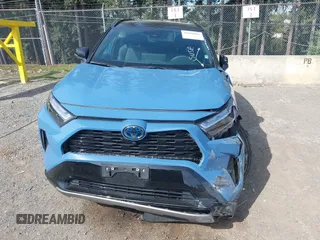 2024 Toyota RAV4 Hybrid XSE z VIN 2T3E6RFV9RW075770, wystawiony jako IAAI lot #42036065 z przebiegiem 33 099 mil mil oraz . Historia ofert i sprzedaży dostępna na DreamBid. Obrazek 13.