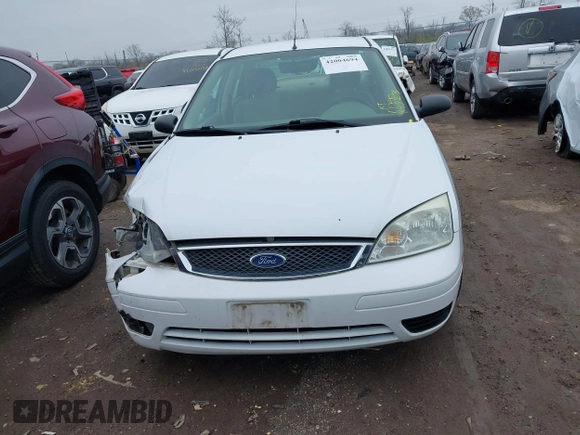 2007 Ford Focus S z VIN 1FAHP34N07W260725, wystawiony jako IAAI lot #42004694 z przebiegiem 84 923 mil mil oraz . Historia ofert i sprzedaży dostępna na DreamBid. Obrazek 12.