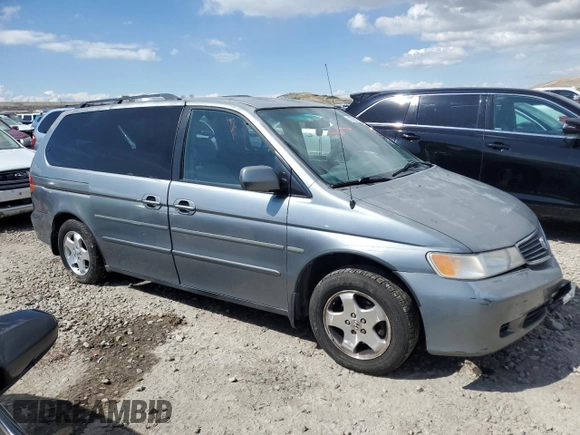 2000 Honda Odyssey EX with VIN 2HKRL1860YH532814, listed as a Copart auction lot 51780855 with 186,328 mi miles and Salvage Title. Bid and sale history available at DreamBid. Image 4.