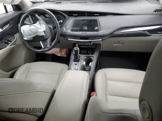 2021 Cadillac XT4 FWD Luxury z VIN 1GYAZAR48MF018135, wystawiony jako Copart lot #43023665 z przebiegiem 54 271 mil mil oraz Szkoda całkowita • Salvage title. Historia ofert i sprzedaży dostępna na DreamBid. Obrazek 8.