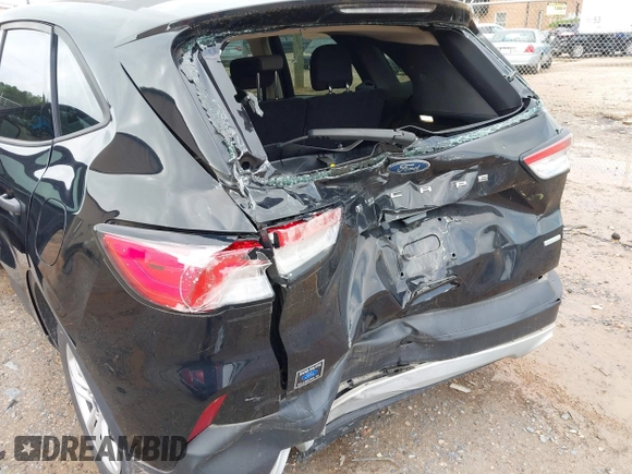 2020 Ford Escape S with VIN 1FMCU0F65LUA21111, listed as a IAAI auction lot 42371480 with 60,988 mi miles and . Bid and sale history available at DreamBid. Image 6.