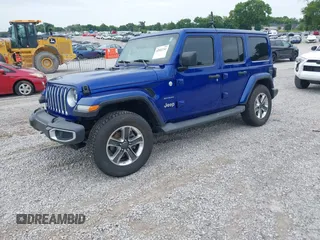 2019 Jeep Wrangler Unlimited Sahara with VIN 1C4HJXEG1KW599117, listed as a IAAI auction lot 42602241 with 109,552 mi miles and . Bid and sale history available at DreamBid. Image 17.