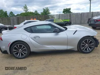 2021 Toyota Supra 2.0 z VIN WZ1DB2C07MW040454, wystawiony jako IAAI lot #42352981 z przebiegiem 30 416 mil mil oraz . Historia ofert i sprzedaży dostępna na DreamBid. Obrazek 13.