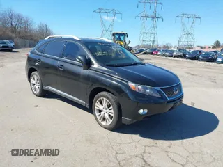 2011 Lexus RX with VIN JTJBC1BA4B2036354, listed as a IAAI auction lot 41696253 with Not Provided miles. Bid and sale history available at carsss.com. Image 1.