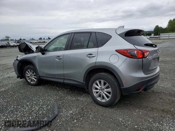 2014 Mazda CX-5 Touring z VIN JM3KE4CYXE0426408, wystawiony jako Copart lot #57355115 z przebiegiem Nie podano mil oraz Szkody całkowita. Historia ofert i sprzedaży dostępna na DreamBid. Obrazek 2.