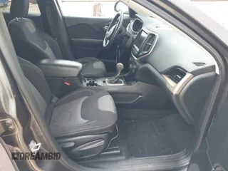 2014 Jeep Cherokee Latitude z VIN 1C4PJLCS1EW319194, wystawiony jako IAAI lot #41710491 z przebiegiem 108 136 mil mil oraz . Historia ofert i sprzedaży dostępna na DreamBid. Obrazek 5.