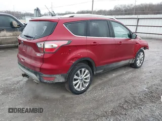 2017 Ford Escape Titanium with VIN 1FMCU9J95HUA48807, listed as a IAAI auction lot 41522636 with 218,342 mi miles. Bid and sale history available at carsss.com. Image 4.