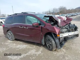 2021 Honda Odyssey Touring with VIN 5FNRL6H80MB020994, listed as a IAAI auction lot 41581023 with Not Provided miles. Bid and sale history available at carsss.com. Image 1.