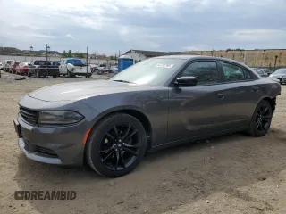 2018 Dodge Charger SXT with VIN 2C3CDXBG9JH337532, listed as a Copart auction lot 52203795 with 82,392 mi miles and Salvage Title. Bid and sale history available at DreamBid. Image 1.
