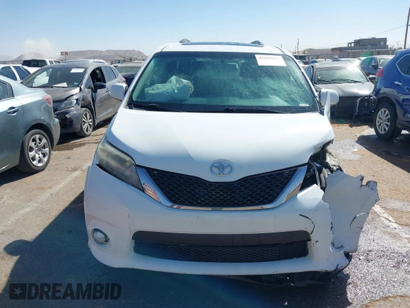 2014 Toyota Sienna SE with VIN 5TDXK3DC1ES417081, listed as a IAAI auction lot 41850444 with 173,545 mi miles. Bid and sale history available at carsss.com. Image 12.