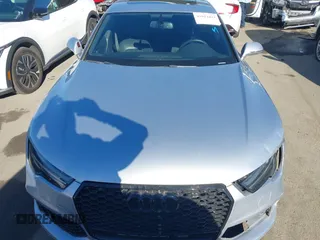 2016 Audi A7 3.0 Premium Plus with VIN WAUWGAFC8GN012047, listed as a IAAI auction lot 41012423 with 77,778 mi miles. Bid and sale history available at carsss.com. Image 13.