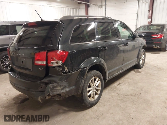 2013 Dodge Journey SXT with VIN 3C4PDDBGXDT571489, listed as a IAAI auction lot 42015939 with 206,550 mi miles and . Bid and sale history available at DreamBid. Image 4.