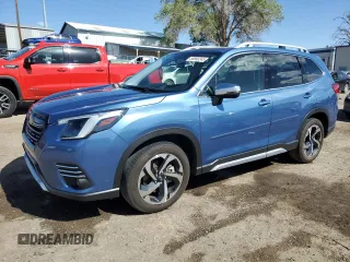 2023 Subaru Forester Touring with VIN JF2SKARC6PH502188, listed as a Copart auction lot 56960245 with 10,487 mi miles and Salvage title. Bid and sale history available at DreamBid. Image 1.