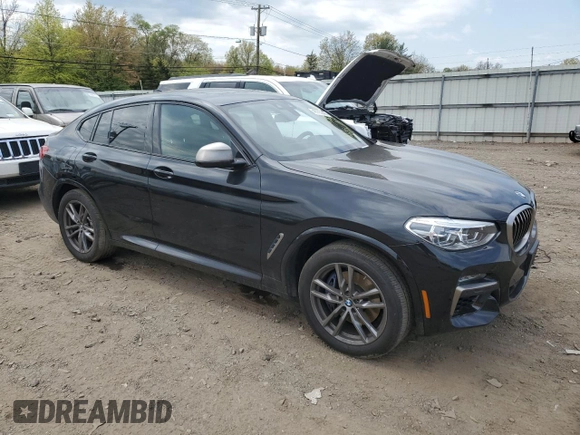 2020 BMW X4 M40i with VIN 5UX2V5C06LLE69603, listed as a Copart auction lot 49705043 with 31,939 mi miles. Bid and sale history available at carsss.com. Image 4.
