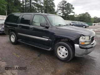 2004 GMC Yukon XL SLT with VIN 1GKEC16Z34J292613, listed as a Copart auction lot 54796584 with 237,445 mi miles and Salvage Title. Bid and sale history available at carsss.com. Image 4.