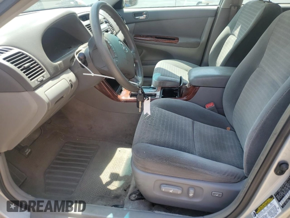 2005 Toyota Camry STD с VIN 4T1BE32K45U041477, выставлен на аукционе Copart как лот 57129635 с пробегом 216 497 миль миль и Списание • Salvage title. История ставок и продаж доступна на DreamBid. Изображение 7.