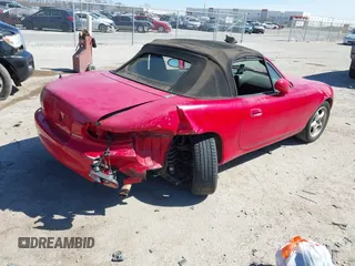 2001 Mazda MX-5 Miata z VIN JM1NB353910201434, wystawiony jako IAAI lot #41817576 z przebiegiem 209 104 mil mil oraz . Historia ofert i sprzedaży dostępna na DreamBid. Obrazek 4.
