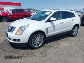 2013 Cadillac SRX Performance Collection z VIN 3GYFNDE35DS578495, wystawiony jako IAAI lot #42323061 z przebiegiem 160 473 mil mil oraz . Historia ofert i sprzedaży dostępna na DreamBid. Obrazek 2.