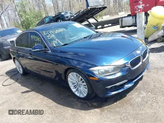 2013 BMW 3 Series 328i xDrive with VIN WBA3B3C54DF532965, listed as a IAAI auction lot 41955104 with 150,455 mi miles. Bid and sale history available at carsss.com. Image 1.