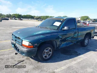1998 Dodge Dakota SLT with VIN 1B7FL26X2WS685844, listed as a IAAI auction lot 41857719 with Not Provided miles and . Bid and sale history available at carsss.com. Image 2.