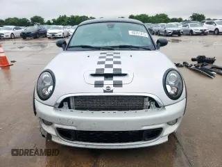 2015 MINI Coupe S z VIN WMWSX3C51FT409464, wystawiony jako Copart lot #60761415 z przebiegiem Nie podano mil oraz Czysty tytuł • Clean title. Historia ofert i sprzedaży dostępna na DreamBid. Obrazek 5.