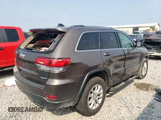 2021 Jeep Grand Cherokee Laredo E z VIN 1C4RJEAG7MC511092, wystawiony jako Copart lot #59144995 z przebiegiem 65 086 mil mil oraz Czysty tytuł • Clean title. Historia ofert i sprzedaży dostępna na DreamBid. Obrazek 3.
