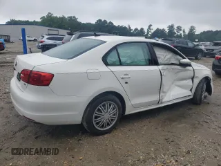 2014 Volkswagen Jetta SE with VIN 3VWD17AJ5EM365810, listed as a Copart auction lot 60676755 with 119,975 mi miles and Salvage title. Bid and sale history available at DreamBid. Image 3.