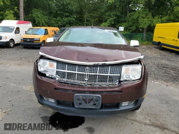 2010 Lincoln MKX with VIN 2LMDJ8JC9ABJ30736, listed as a Copart auction lot 71791594 with 116,083 mi miles and Salvage Title. Bid and sale history available at DreamBid. Image 5.