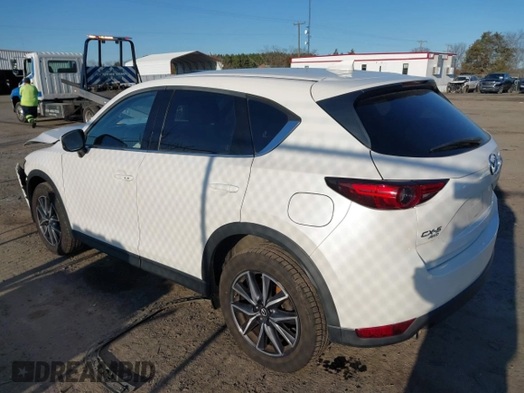 2018 Mazda CX-5 S Premium with VIN JM3KFBDM8J1419006, listed as a IAAI auction lot 41498658 with 123,622 mi miles and . Bid and sale history available at DreamBid. Image 3.