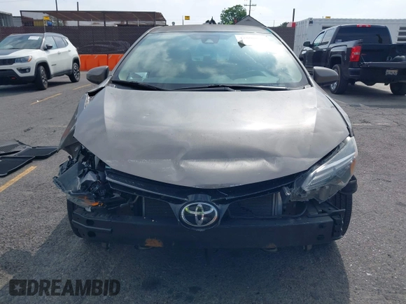 2018 Toyota Corolla L with VIN 5YFBURHE6JP774827, listed as a IAAI auction lot 42598086 with 29,400 mi miles and . Bid and sale history available at DreamBid. Image 12.