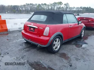 2006 MINI Convertible with VIN WMWRF33526TF64836, listed as a IAAI auction lot 41766880 with 207,094 mi miles and . Bid and sale history available at DreamBid. Image 4.