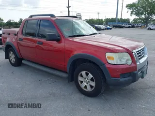 2007 Ford Explorer Sport Trac XLT with VIN 1FMEU31K47UA00772, listed as a IAAI auction lot 41870795 with 196,070 mi miles. Bid and sale history available at carsss.com. Image 1.