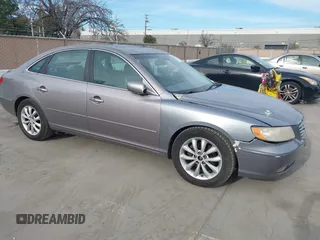 2006 Hyundai Azera SE with VIN KMHFC46F06A121940, listed as a IAAI auction lot 41707660 with 209,461 mi miles and . Bid and sale history available at DreamBid. Image 1.