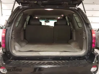 2004 GMC Envoy SLE with VIN 1GKDT13S542265104, listed as a IAAI auction lot 41884797 with 154,190 mi miles. Bid and sale history available at carsss.com. Image 18.