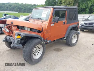 2001 Jeep Wrangler Sport z VIN 1J4FA49S01P341940, wystawiony jako IAAI lot #42542715 z przebiegiem 87 651 mil mil oraz . Historia ofert i sprzedaży dostępna na DreamBid. Obrazek 2.