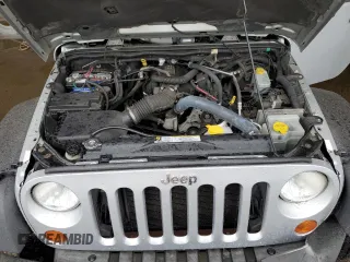 2007 Jeep Wrangler Unlimited Rubicon with VIN 1J4GA69187L127012, listed as a Copart auction lot 48818965 with 61,737 mi miles and Salvage title. Bid and sale history available at DreamBid. Image 12.