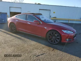 2015 Tesla Model S 85D with VIN 5YJSA1E40FF114095, listed as a Copart auction lot 84114284 with 114,882 mi miles and Salvage Title. Bid and sale history available at carsss.com. Image 4.