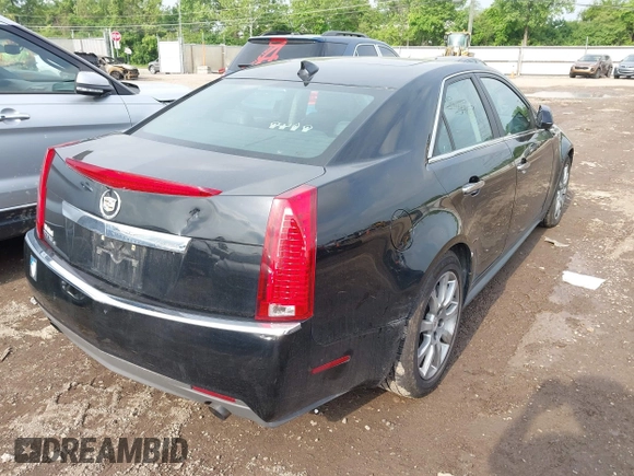 2012 Cadillac CTS Luxury z VIN 1G6DG5E57C0131349, wystawiony jako IAAI lot #42272340 z przebiegiem 61 879 mil mil oraz . Historia ofert i sprzedaży dostępna na DreamBid. Obrazek 4.