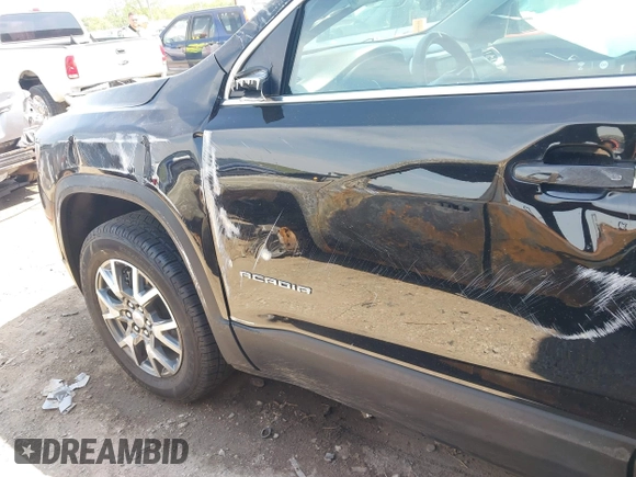 2023 GMC Acadia SLT with VIN 1GKKNML4XPZ223446, listed as a IAAI auction lot 42056061 with 36,678 mi miles and . Bid and sale history available at carsss.com. Image 6.