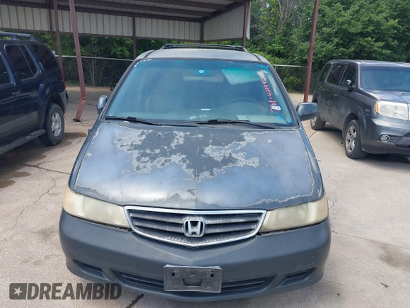 2004 Honda Odyssey EX-L with VIN 5FNRL18974B059223, listed as a IAAI auction lot 42249508 with 247,856 mi miles and . Bid and sale history available at DreamBid. Image 6.