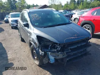 2016 Ford Escape Titanium with VIN 1FMCU9J99GUB27573, listed as a IAAI auction lot 42445457 with 156,784 mi miles and . Bid and sale history available at DreamBid. Image 1.