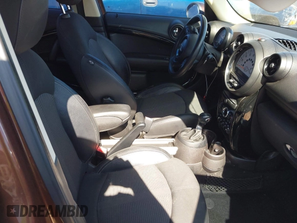 2013 MINI Countryman S ALL4 with VIN WMWZC5C58DWP30998, listed as a IAAI auction lot 42594984 with 153,792 mi miles and . Bid and sale history available at DreamBid. Image 5.